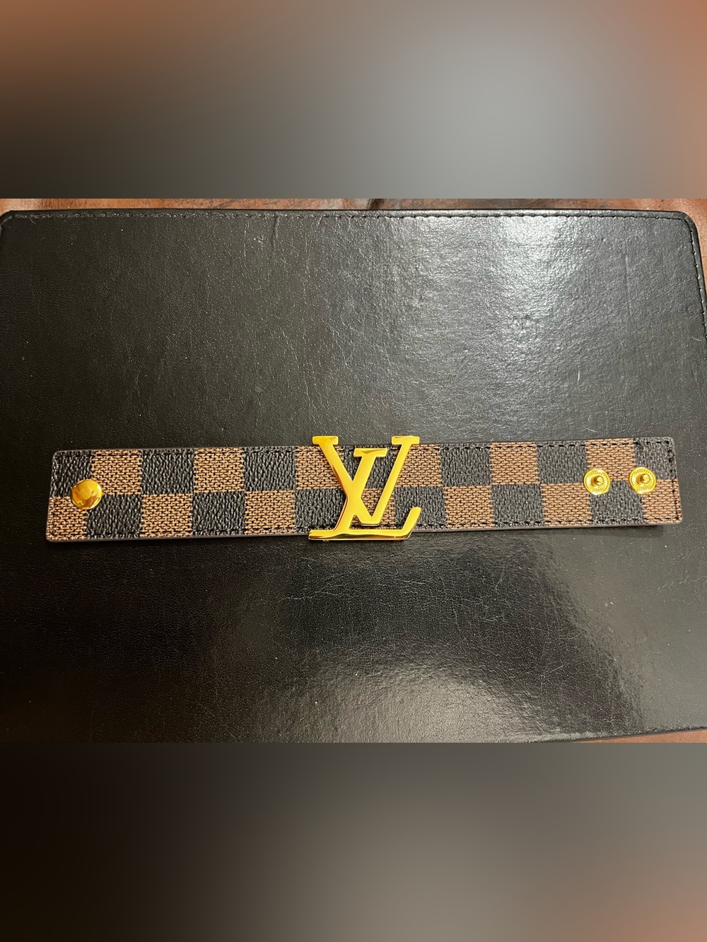 Louis. Vuitton. Damier Gold Tone Letter Logo Bracelet